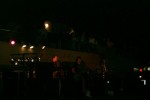 A crowd gathers on the balcony