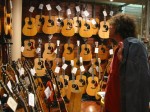 Peter checks out a wall of pricey acoustics
