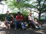 Steve, Peter & Tom pause in "Tom's Park" before heading to that night's show.